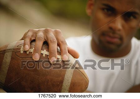 Stock Image - A football player. Fotosearch