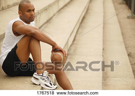Stock Photo - A football player. Fotosearch