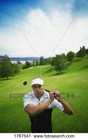 Stock Image - A golfer. Fotosearch