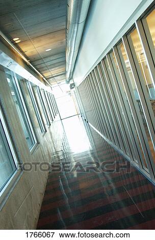 Stock Photo - A light at the end of the hallway. Fotosearch