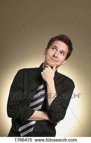 A man in thought View Large Photo Image Stock Photography - A man in thought. Fotosearch