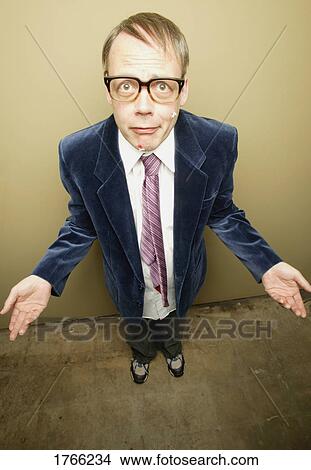Picture - A man wondering why. Fotosearch