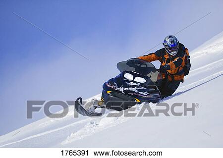 Stock Image - A ski-doo in action. Fotosearch