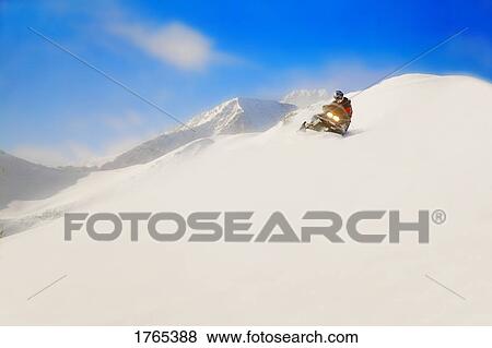 Stock Photo - A ski-doo in action. Fotosearch