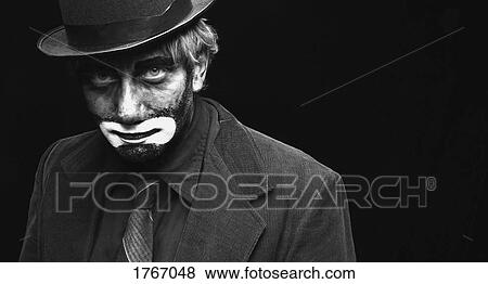 Stock Photo - A timid businessman. Fotosearch
