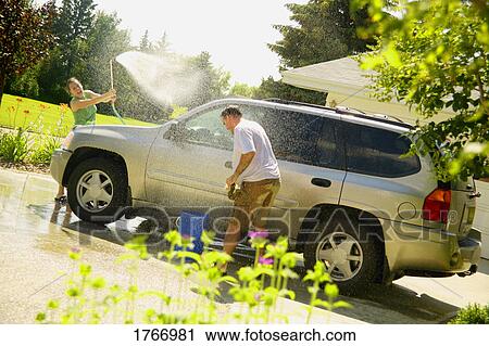 A water fight View Large Photo Image Stock Image - A water fight. Fotosearch