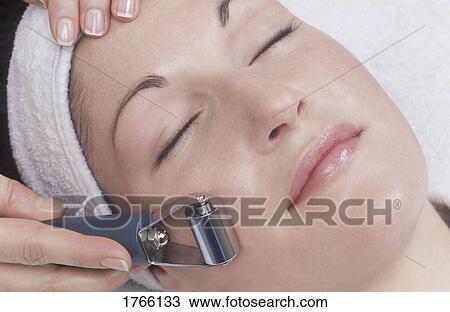 A woman at a spa View Large Photo Image Stock Image - A woman at a spa. Fotosearch