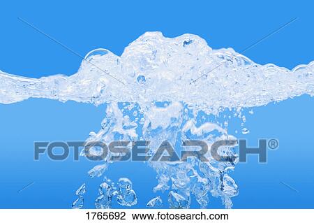 Stock Image - Bubbles in water. Fotosearch