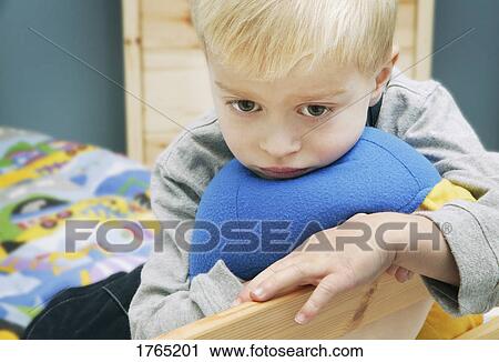 Stock Image - Child feels sad. Fotosearch
