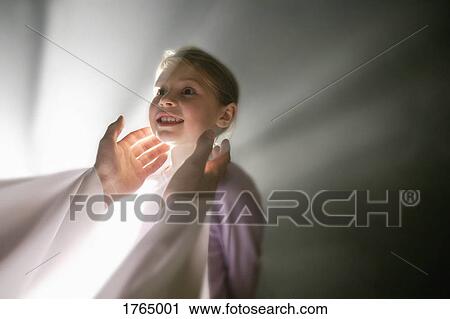 Stock Image - Child is welcomed into the arms of Jesus. Fotosearch