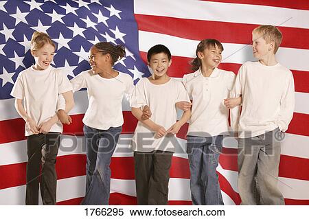Stock Photography - Children in front of American flag. Fotosearch