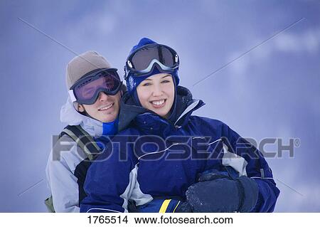 Couple doing winter sports View Large Photo Image Picture - Couple doing winter sports. Fotosearch