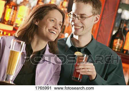Couple in a lounge View Large Photo Image Stock Image - Couple in a lounge. Fotosearch