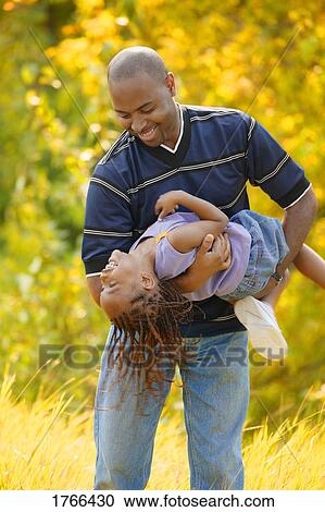 Fun with dad View Large Photo Image Stock Image - Fun with dad. Fotosearch