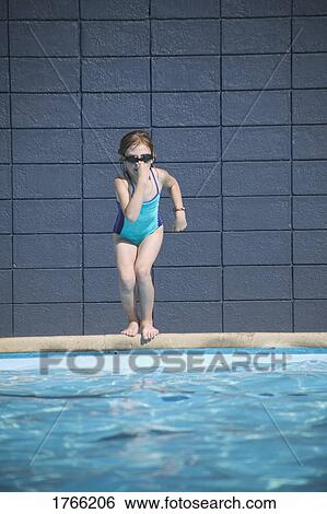 Girl runs into swimming pool View Large Photo Image Stock Photograph - Girl runs into swimming pool. Fotosearch