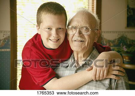 Stock Image - Grandfather and grandchild. Fotosearch
