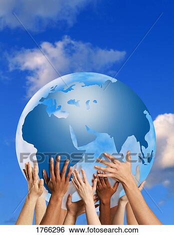 Stock Photograph - Hands touching a globe. Fotosearch