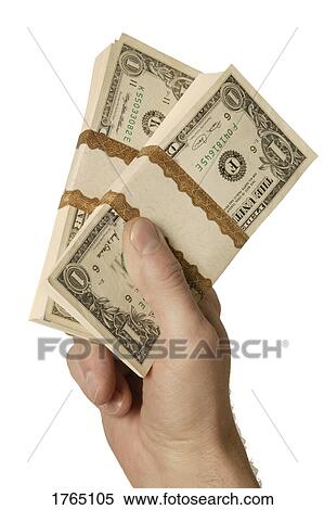 Holding stacks of money View Large Photo Image Stock Photography - Holding stacks of money. Fotosearch