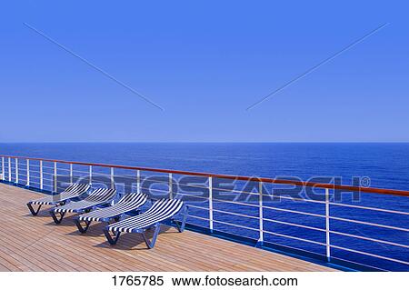Lounging chairs in a row View Large Photo Image Stock Photography - Lounging chairs in a row. Fotosearch