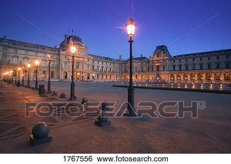 Stock Photograph - Louvre at night Paris France. Fotosearch