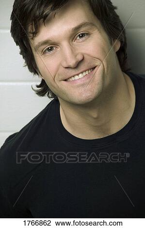 Stock Image - Man smiles. Fotosearch