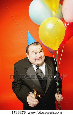 Man with balloons View Large Photo Image Stock Photograph - Man with balloons. Fotosearch