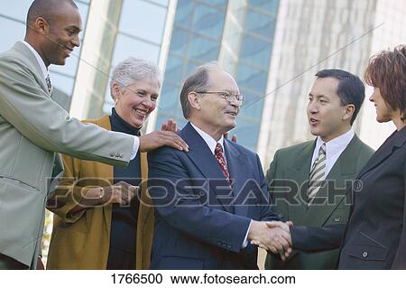 Offering congratulations View Large Photo Image Stock Image - Offering congratulations. Fotosearch