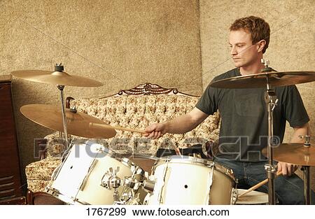 Stock Photo - Playing the drums. Fotosearch