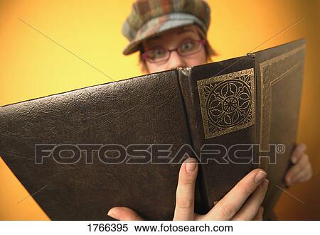 Student reads a book View Large Photo Image Stock Photography - Student reads a book. Fotosearch