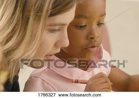 Teacher and child View Large Photo Image Stock Photo - Teacher and child. Fotosearch