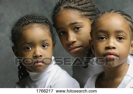 Stock Photo - Three children. Fotosearch
