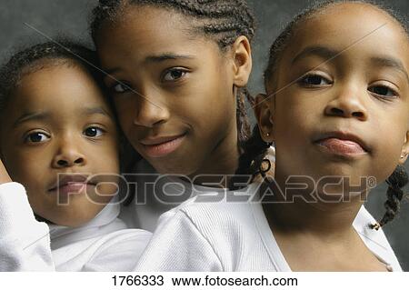 Stock Image - Three girls. Fotosearch