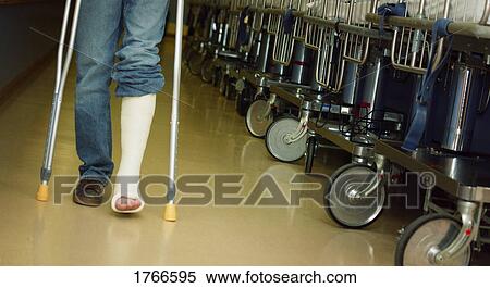 Walking with crutches View Large Photo Image Stock Photography - Walking with crutches. Fotosearch