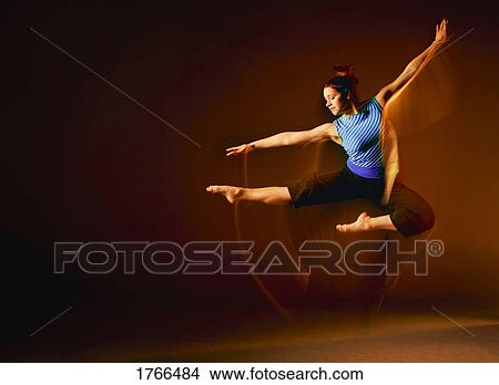 Picture - Woman dances. Fotosearch