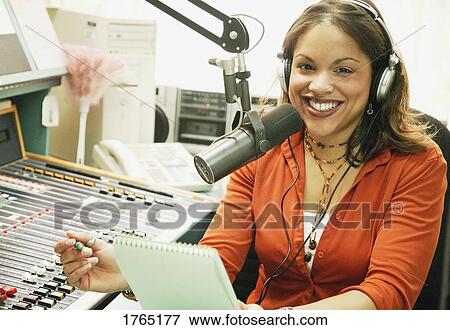 Stock Photo - Woman in a studio. Fotosearch