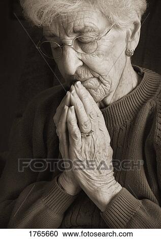 Woman prays View Large Photo Image Stock Image - Woman prays. Fotosearch