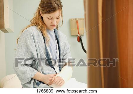 Woman with broken arm View Large Photo Image Stock Photo - Woman with broken arm. Fotosearch