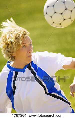Woman with soccer ball View Large Photo Image Picture - Woman with soccer ball. Fotosearch