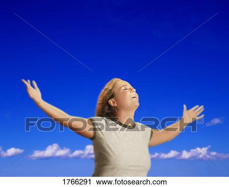 Stock Image - Woman worshipping. Fotosearch