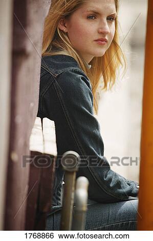 A blonde teenage girl View Large Photo Image Stock Photograph - A blonde teenage girl. Fotosearch