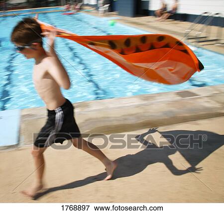 A child pretends to fly View Large Photo Image Stock Photo - A child pretends to fly. Fotosearch