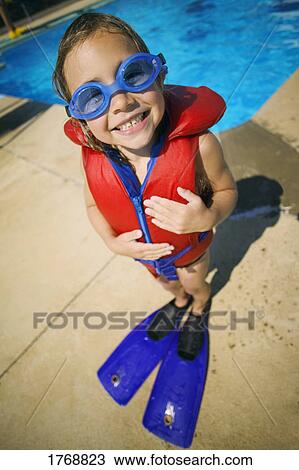 Stock Image - A child ready to go swimming. Fotosearch
