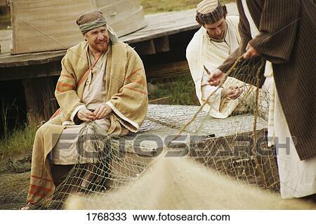 Stock Image - A group of fishermen. Fotosearch