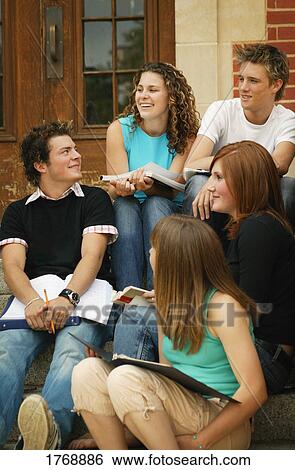 A group of students and books View Large Photo Image Stock Photograph - A group of students and books. Fotosearch
