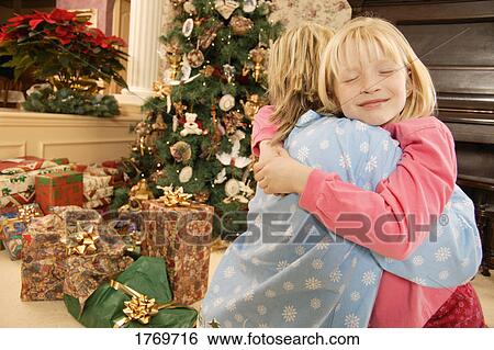 Stock Photograph - A hug of thanks. Fotosearch