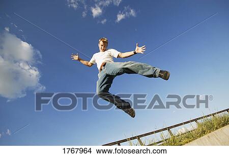 Picture - A jumping man. Fotosearch