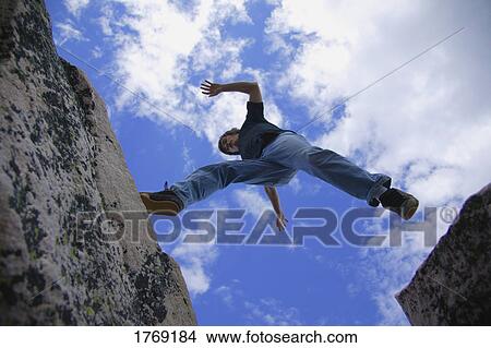 Picture - A risky leap. Fotosearch