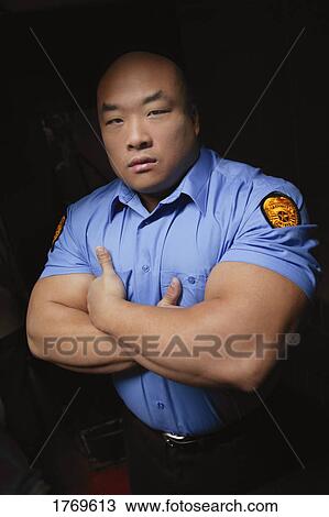 Stock Image - A security guard. Fotosearch