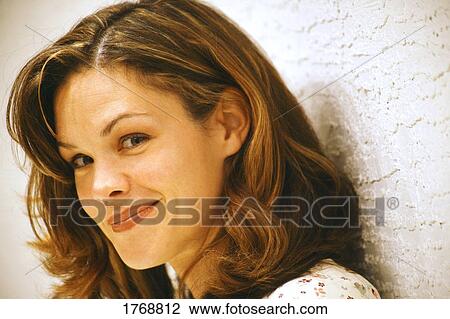 A woman smiles View Large Photo Image Stock Image - A woman smiles. Fotosearch