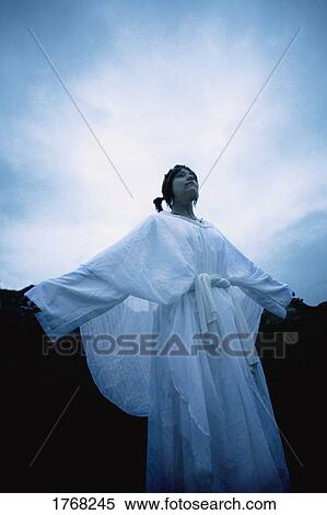 An angel delivers a message View Large Photo Image Stock Photography - An angel delivers a message. Fotosearch
